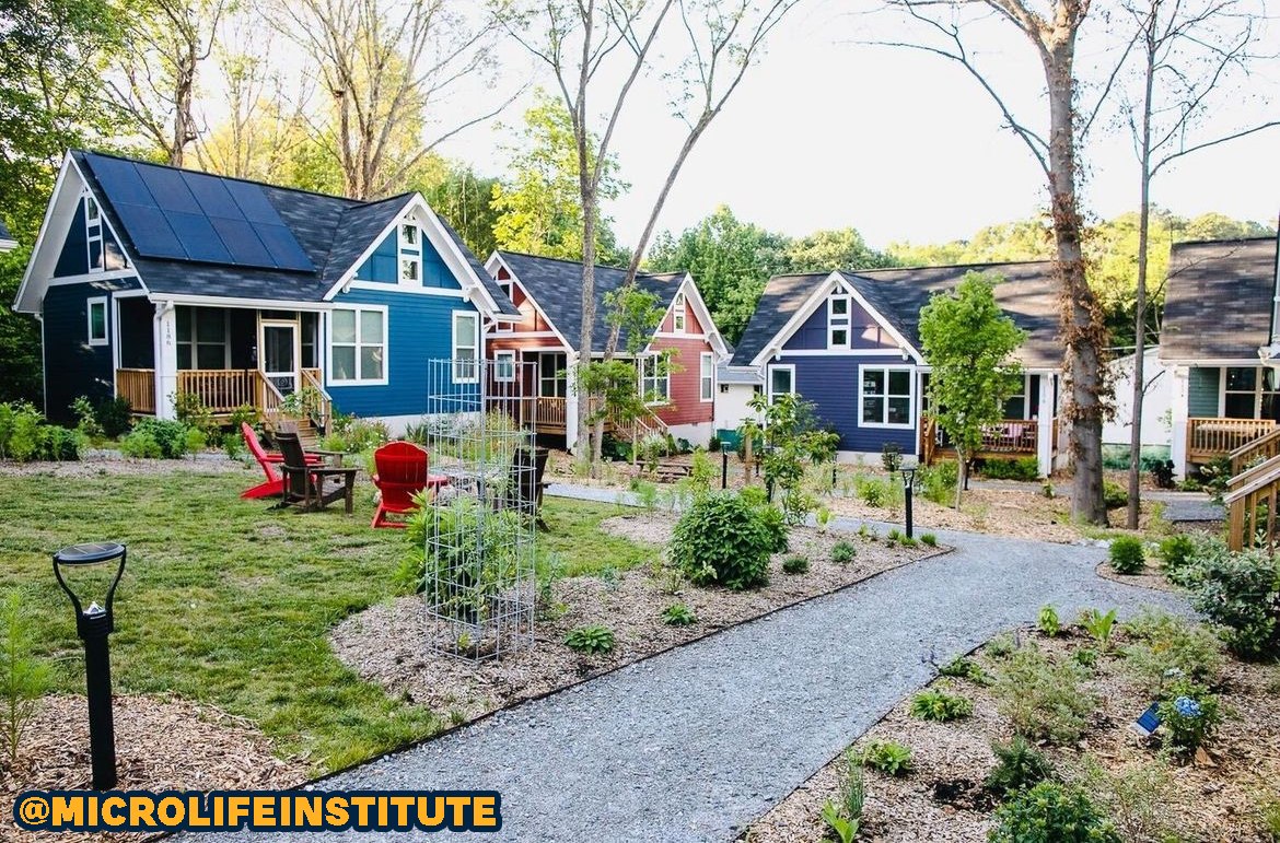 The meme is a humorous image of a small, idyllic neighborhood with several houses and a garden. The image is captioned "I'm not arguing, I'm just explaining why I'm right." The meme is likely referencing a common online phenomenon where someone is being stubbornly argumentative and refusing to listen to others' perspectives.